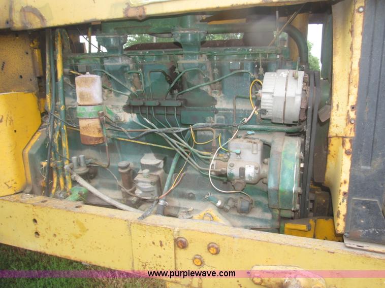 image for item F7054 John Deere 700 tractor