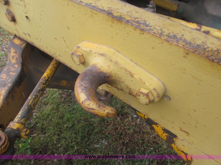 image for item F7054 John Deere 700 tractor