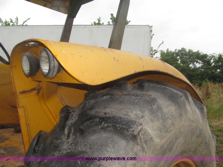 image for item F7054 John Deere 700 tractor