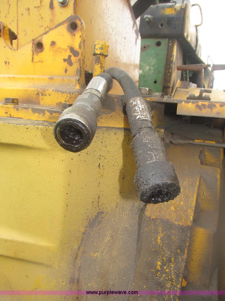 image for item F7054 John Deere 700 tractor