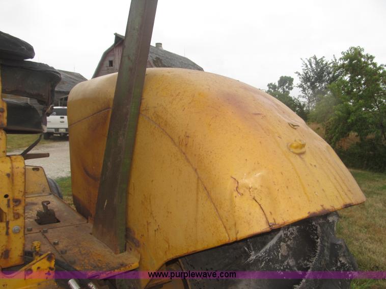 image for item F7054 John Deere 700 tractor