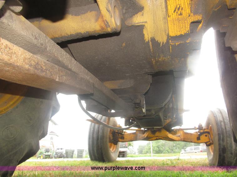 image for item F7054 John Deere 700 tractor