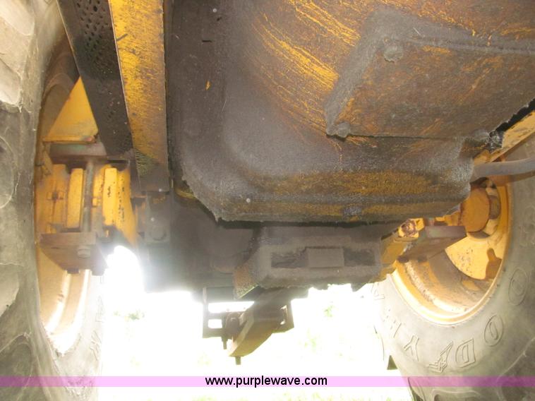 image for item F7054 John Deere 700 tractor