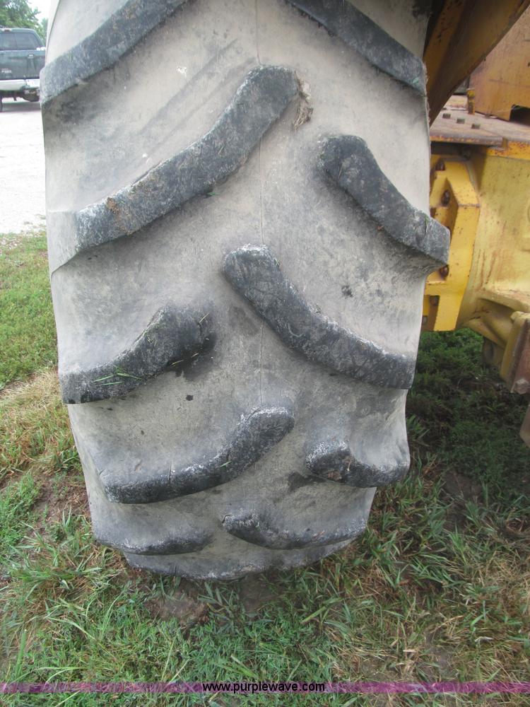 image for item F7054 John Deere 700 tractor