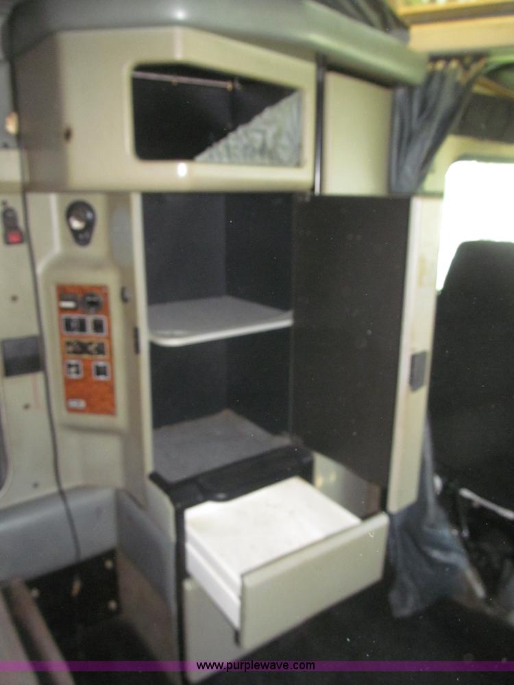 image for item F7075 2000 Kenworth W900 semi truck