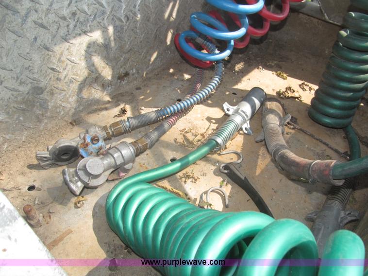 image for item F7075 2000 Kenworth W900 semi truck