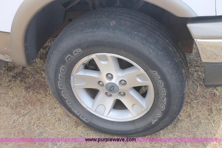 image for item G5766 2002 Ford F150 Lariat SuperCab pickup truck