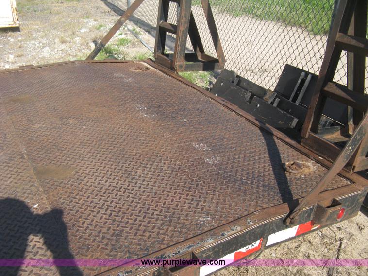 image for item H6480 2002 PJ tandem axle flatbed trailer