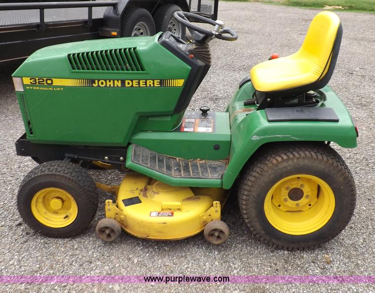 image for item I7674 John Deere 320 lawn mower