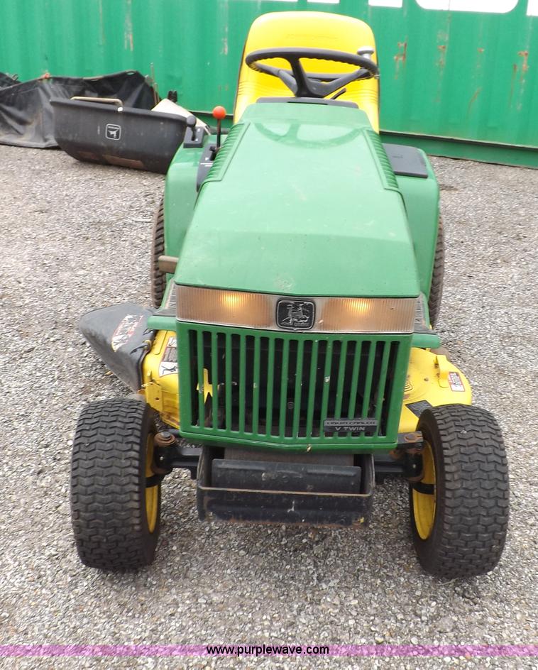 image for item I7674 John Deere 320 lawn mower