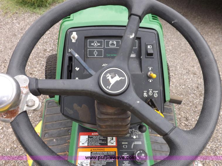 image for item I7674 John Deere 320 lawn mower