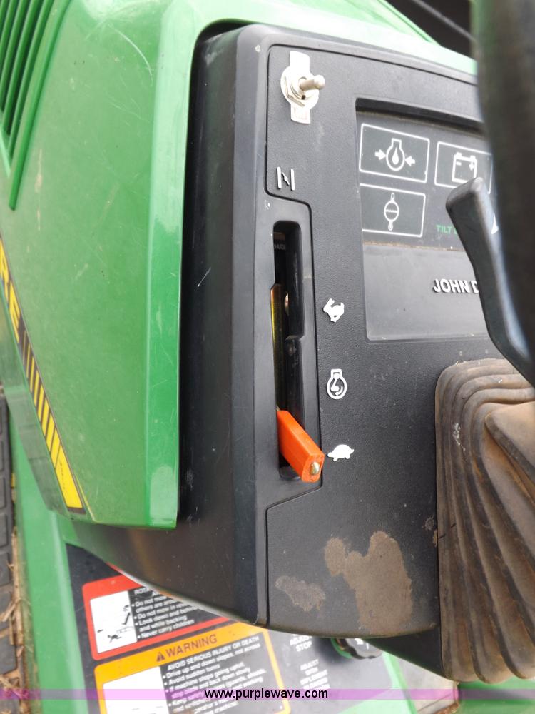 image for item I7674 John Deere 320 lawn mower