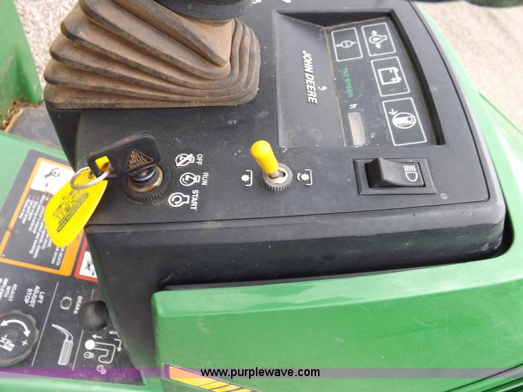 image for item I7674 John Deere 320 lawn mower