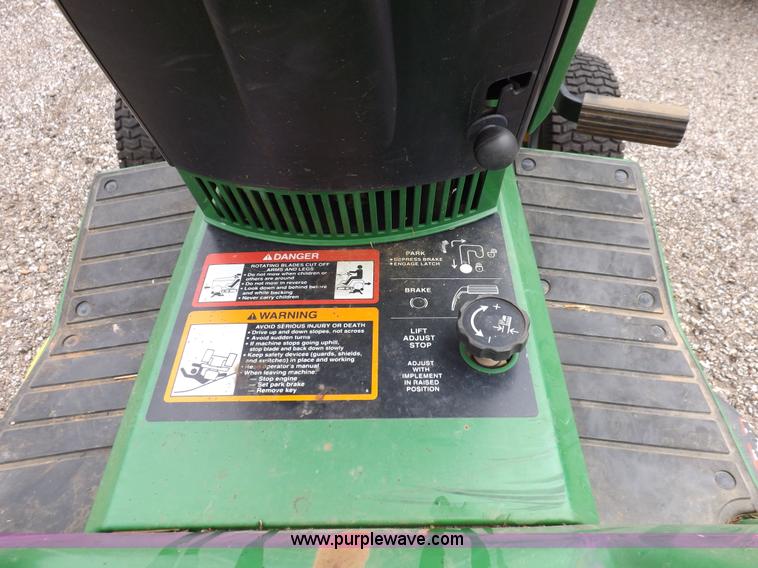 image for item I7674 John Deere 320 lawn mower