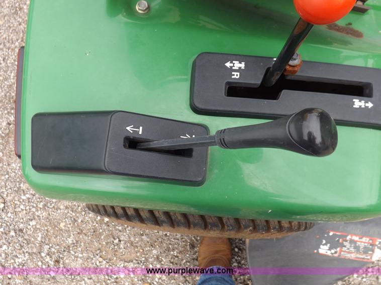 image for item I7674 John Deere 320 lawn mower