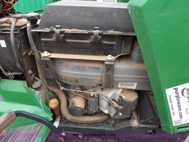 image for item I7674 John Deere 320 lawn mower