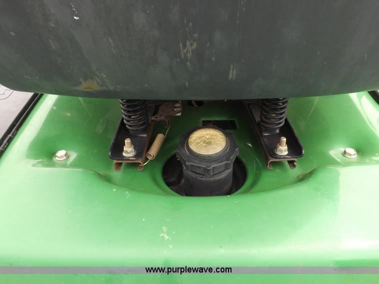 image for item I7674 John Deere 320 lawn mower