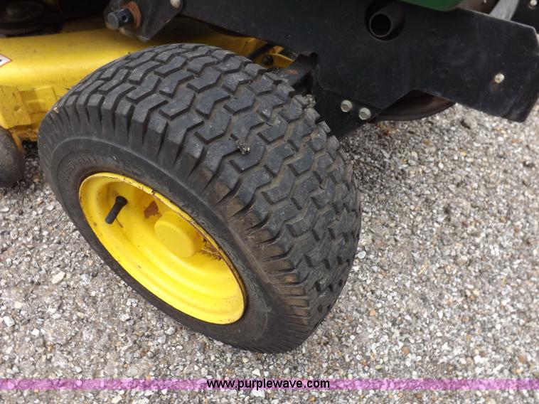 image for item I7674 John Deere 320 lawn mower