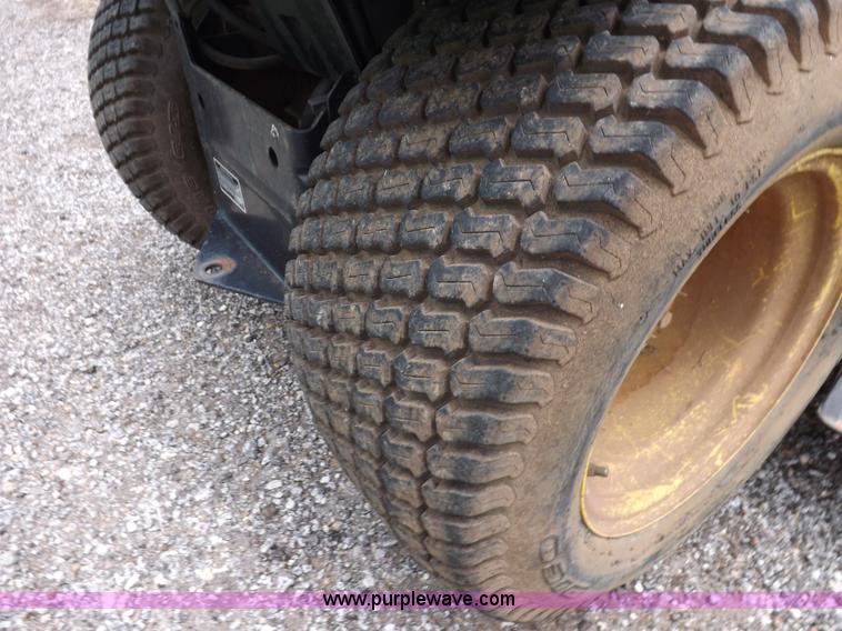 image for item I7674 John Deere 320 lawn mower