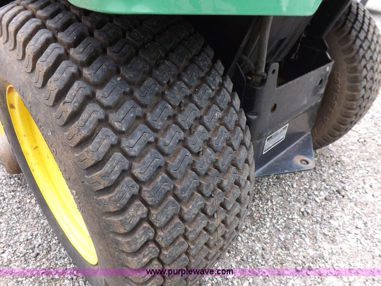 image for item I7674 John Deere 320 lawn mower