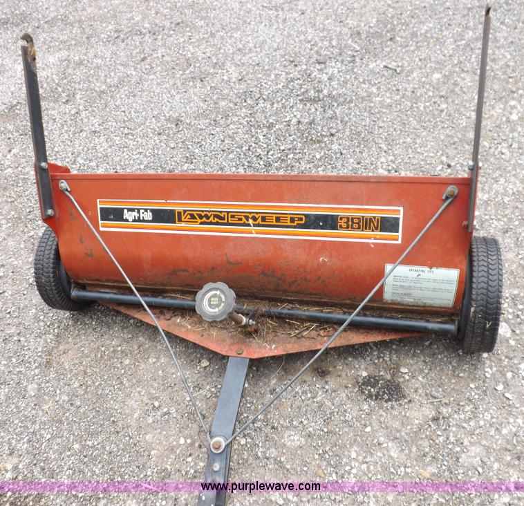 image for item I7674 John Deere 320 lawn mower