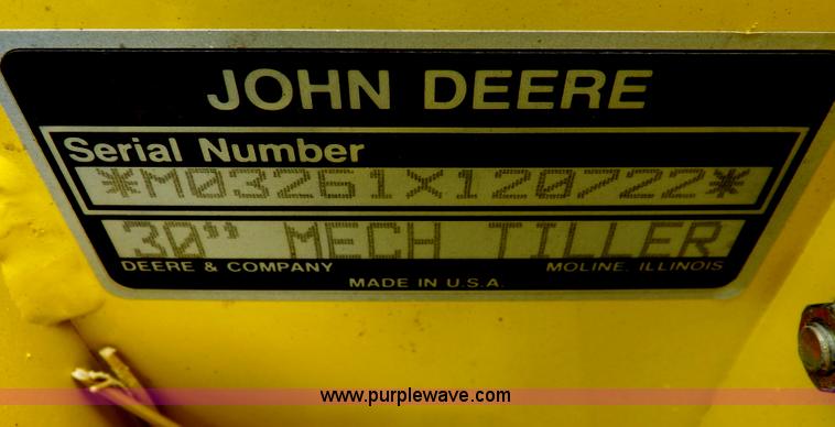 image for item I7674 John Deere 320 lawn mower