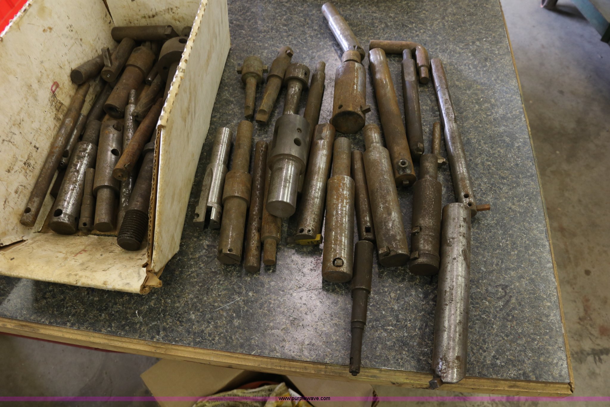 Assorted radius end mills, lathe centers, and boring bars in Lone Jack