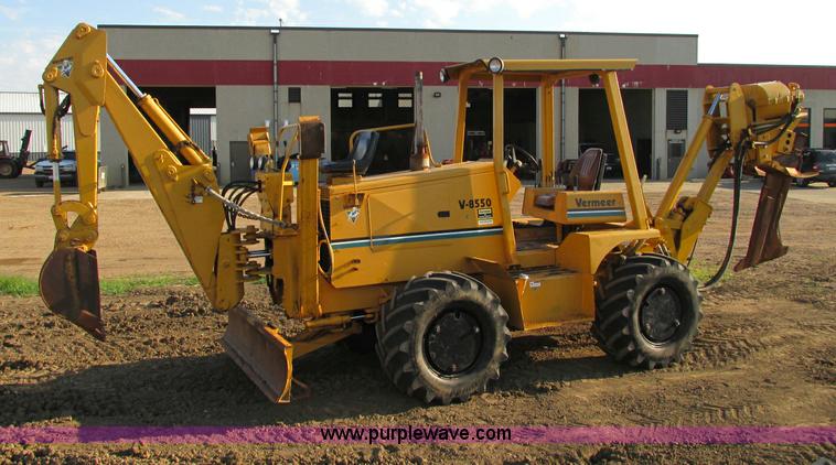 image for item E5184 1995 Vermeer V8550 vibratory plow backhoe