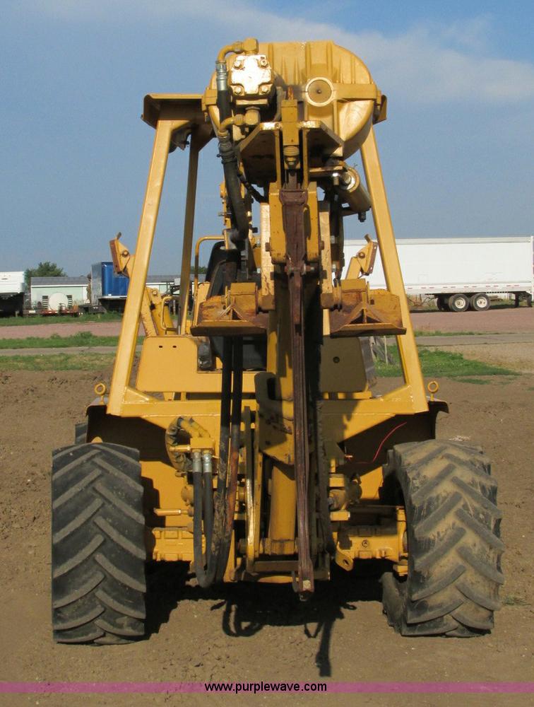 image for item E5184 1995 Vermeer V8550 vibratory plow backhoe