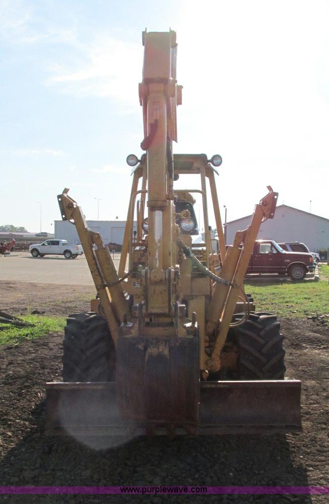 image for item E5184 1995 Vermeer V8550 vibratory plow backhoe