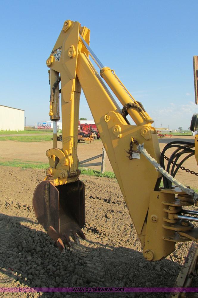 image for item E5184 1995 Vermeer V8550 vibratory plow backhoe