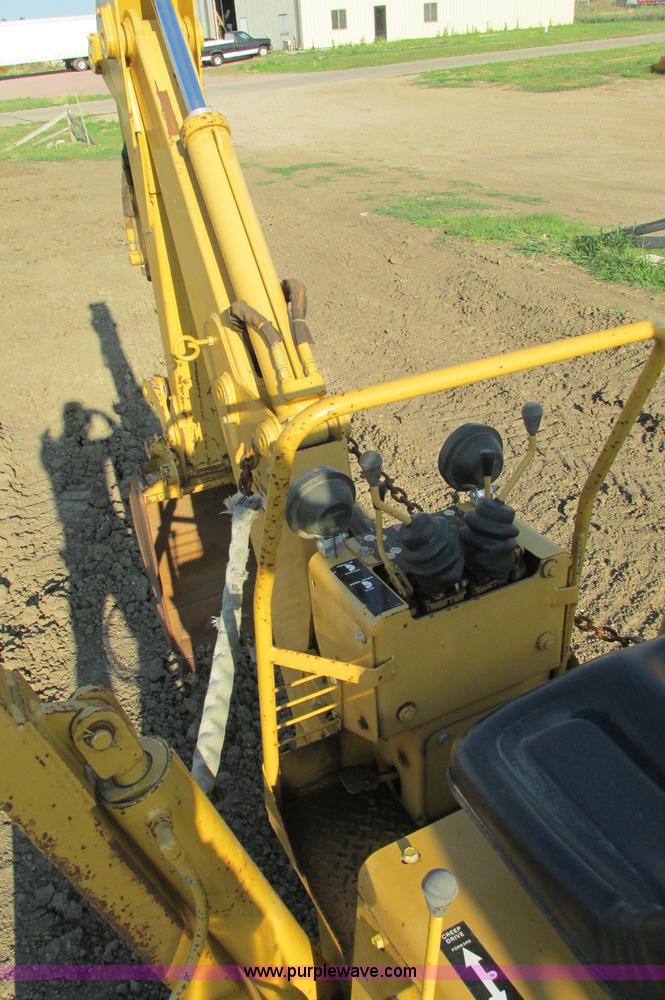 image for item E5184 1995 Vermeer V8550 vibratory plow backhoe