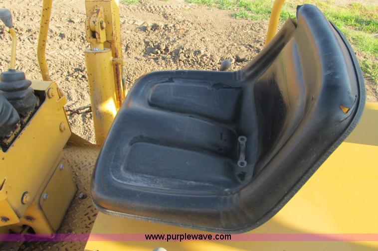 image for item E5184 1995 Vermeer V8550 vibratory plow backhoe