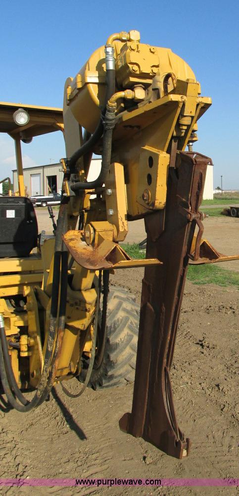image for item E5184 1995 Vermeer V8550 vibratory plow backhoe