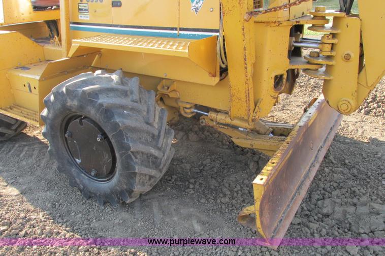 image for item E5184 1995 Vermeer V8550 vibratory plow backhoe