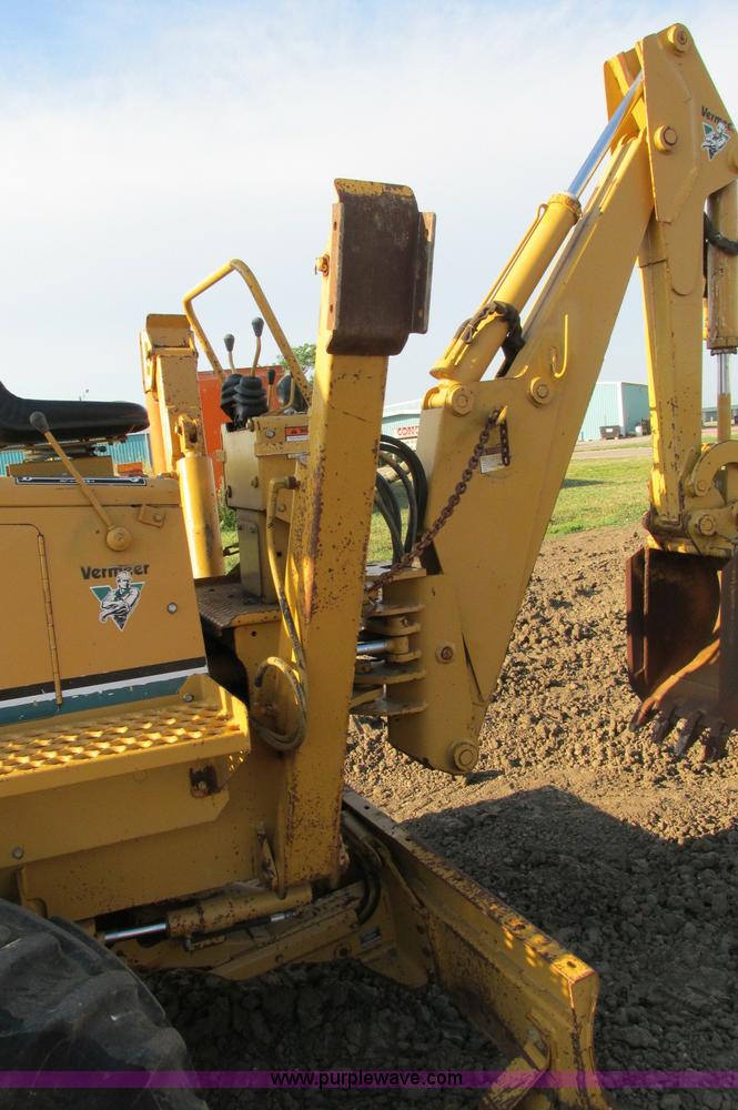 image for item E5184 1995 Vermeer V8550 vibratory plow backhoe