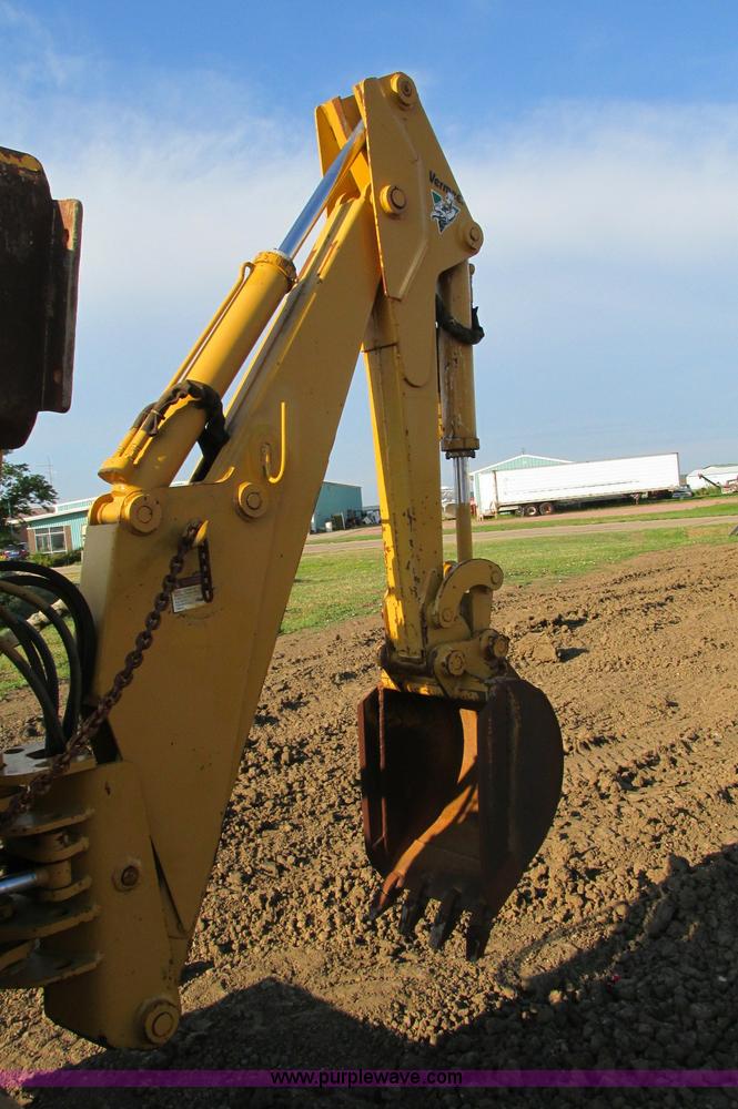 image for item E5184 1995 Vermeer V8550 vibratory plow backhoe