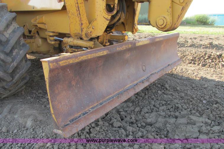 image for item E5184 1995 Vermeer V8550 vibratory plow backhoe