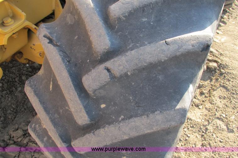 image for item E5184 1995 Vermeer V8550 vibratory plow backhoe