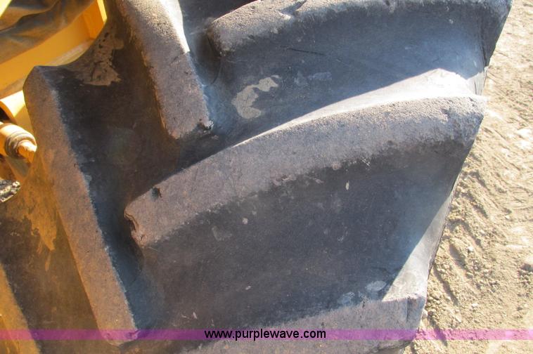 image for item E5184 1995 Vermeer V8550 vibratory plow backhoe