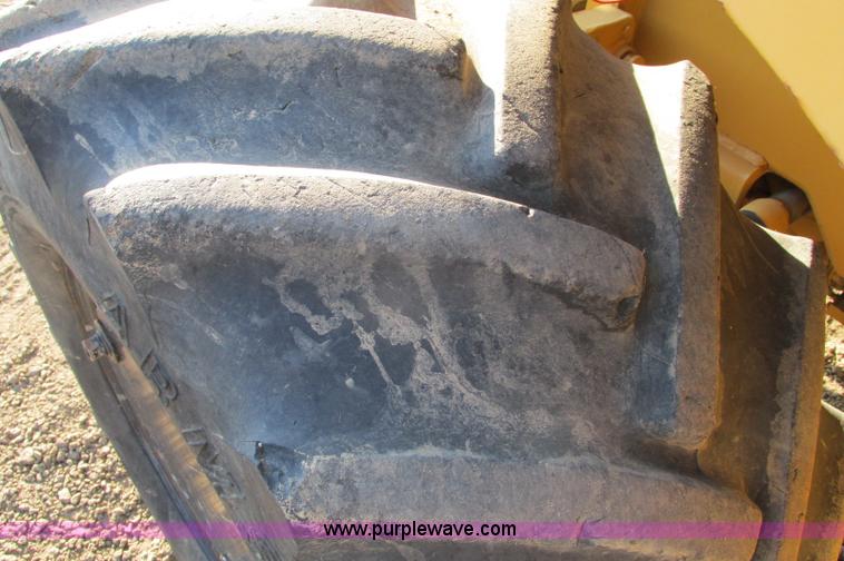 image for item E5184 1995 Vermeer V8550 vibratory plow backhoe