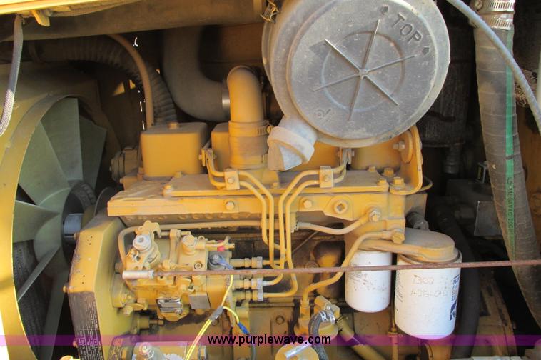 image for item E5184 1995 Vermeer V8550 vibratory plow backhoe