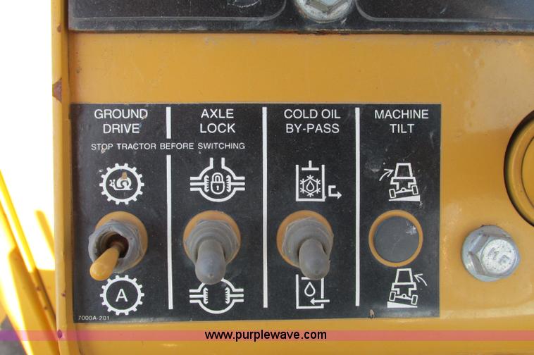 image for item E5184 1995 Vermeer V8550 vibratory plow backhoe