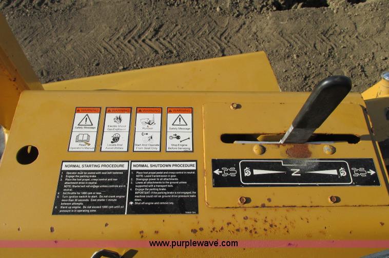 image for item E5184 1995 Vermeer V8550 vibratory plow backhoe