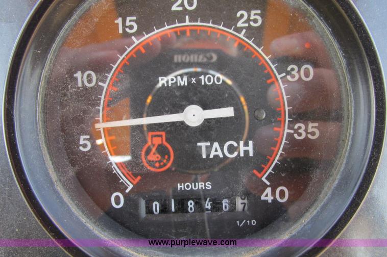 image for item E5184 1995 Vermeer V8550 vibratory plow backhoe