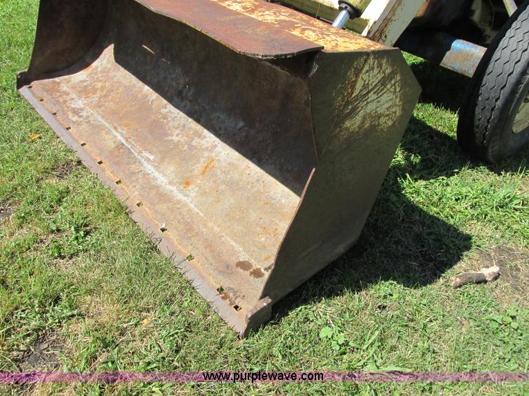 image for item G8574 Ford 450 tractor loader backhoe