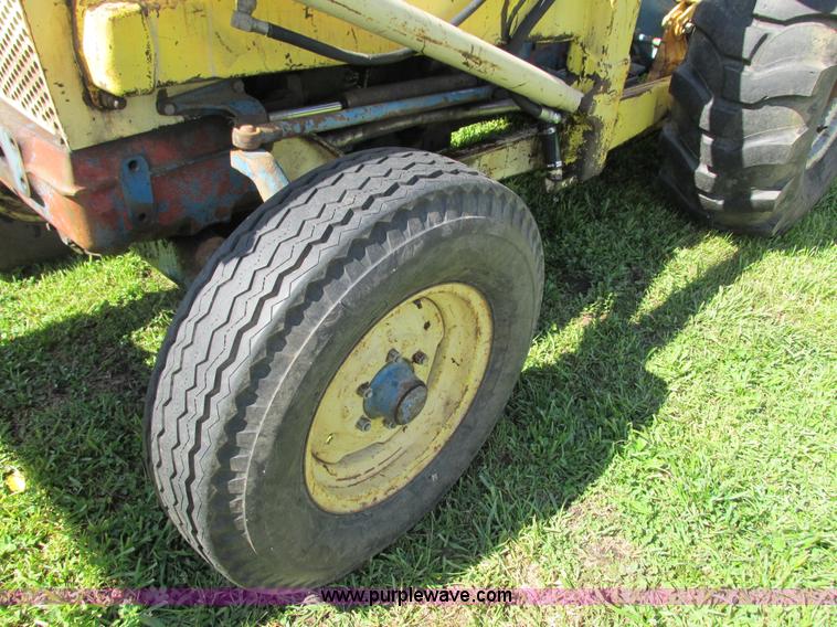 image for item G8574 Ford 450 tractor loader backhoe