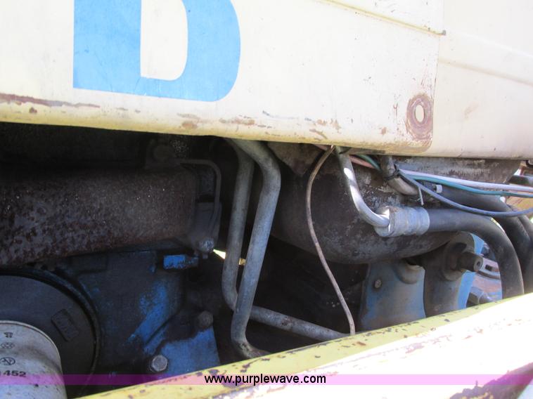 image for item G8574 Ford 450 tractor loader backhoe