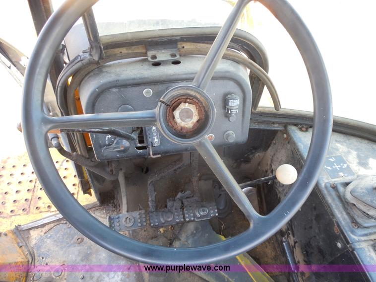 image for item E7598 1984 John Deere 510 Turbo backhoe loader