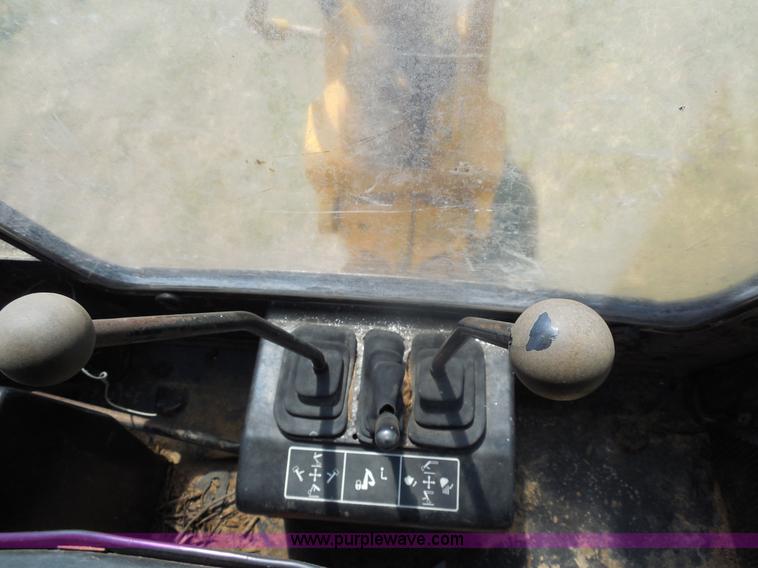 image for item E7598 1984 John Deere 510 Turbo backhoe loader